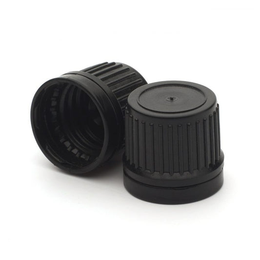 Two black plastic bottle caps with ribbed flanges, one standing upright and the other lying on its side, shown on a white background.
