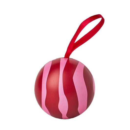 Red and pink striped ornament with a red ribbon on a white background