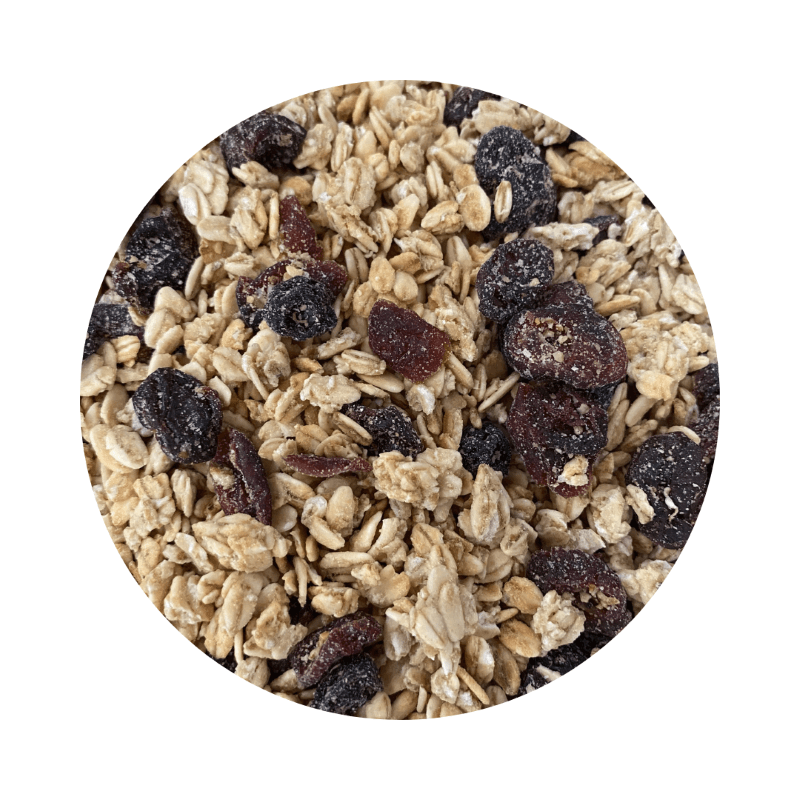 Close-up of mixed oats and dried berries in Berry Granola (per 500g) showing natural organic food texture and ingredients