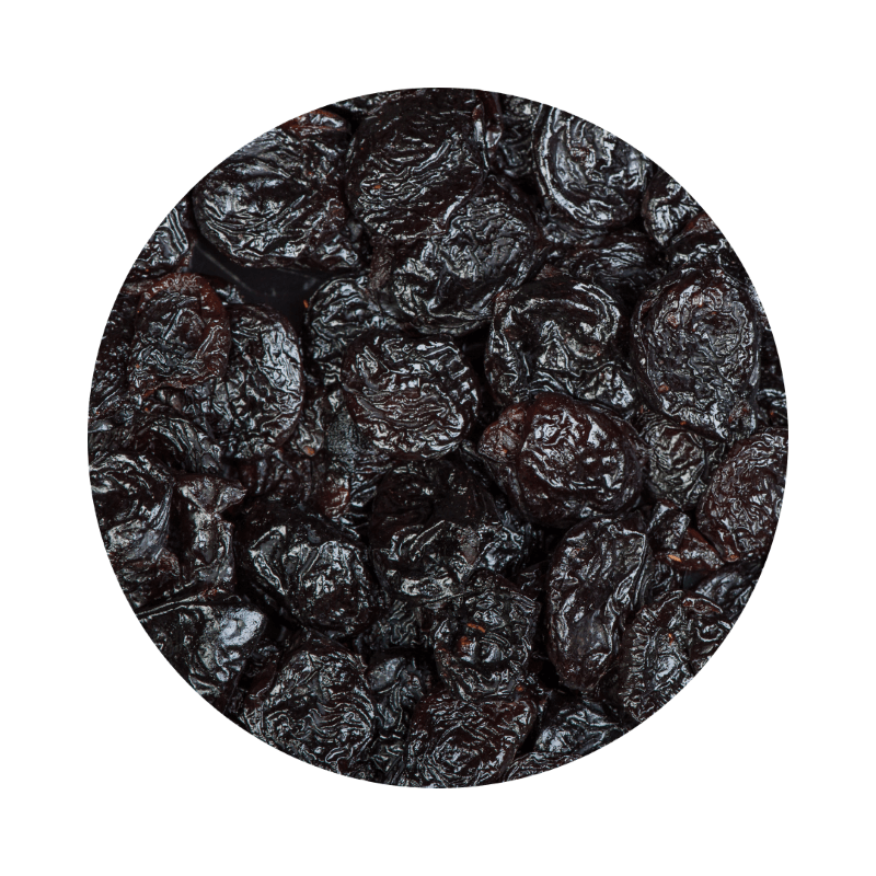 Close-up of dark, wrinkled dried fruit pieces in a round frame, labeled Dried Pitted Prunes ORGANIC (300g)