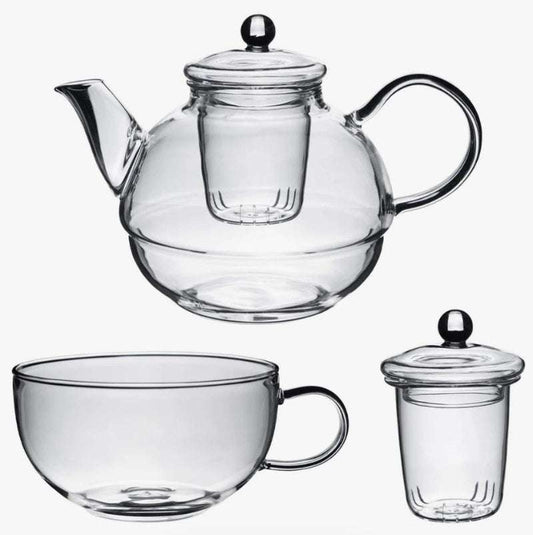 Glass Tea-For-One Tea Pot, Cup and Strainer Set made of clear glass with a modern, minimalist design.