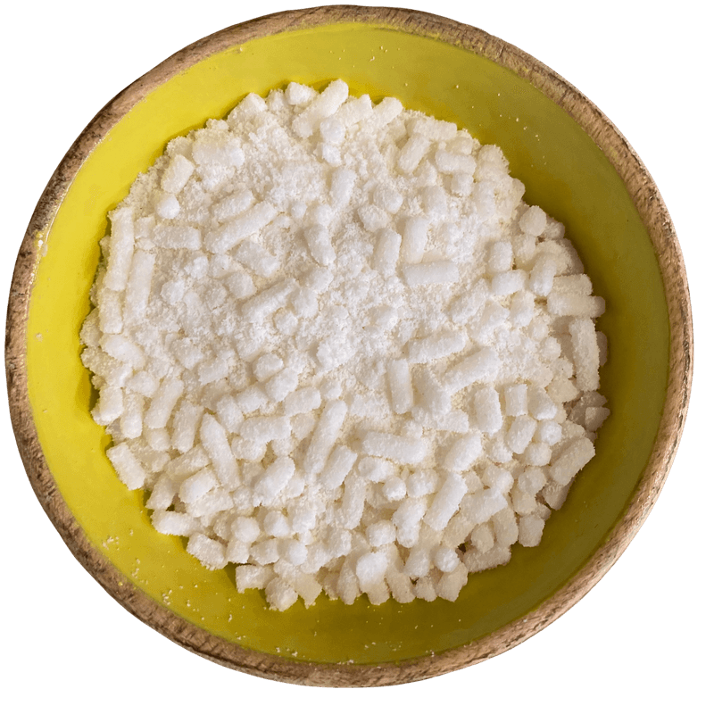 White granular and pellet form VEGAN Suet (per 100g) in a wooden bowl with yellow interior, plant-based and natural product.