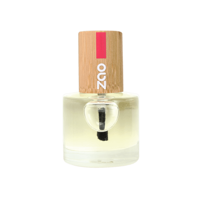 Clear glass bottle with wooden cap containing Nail and Cuticle Care Oil (8ml) for natural skincare and nail health.