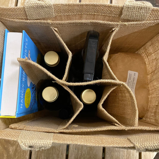 The Nancy Birtwhiste Clean & Green Kit comes in a handy Jute Bottle Bag.