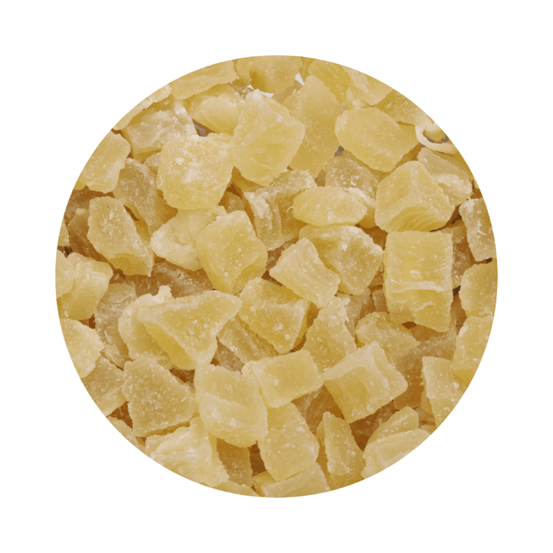 Close-up of small cubed pieces of Dried Pineapple (500g) showing natural texture and color.