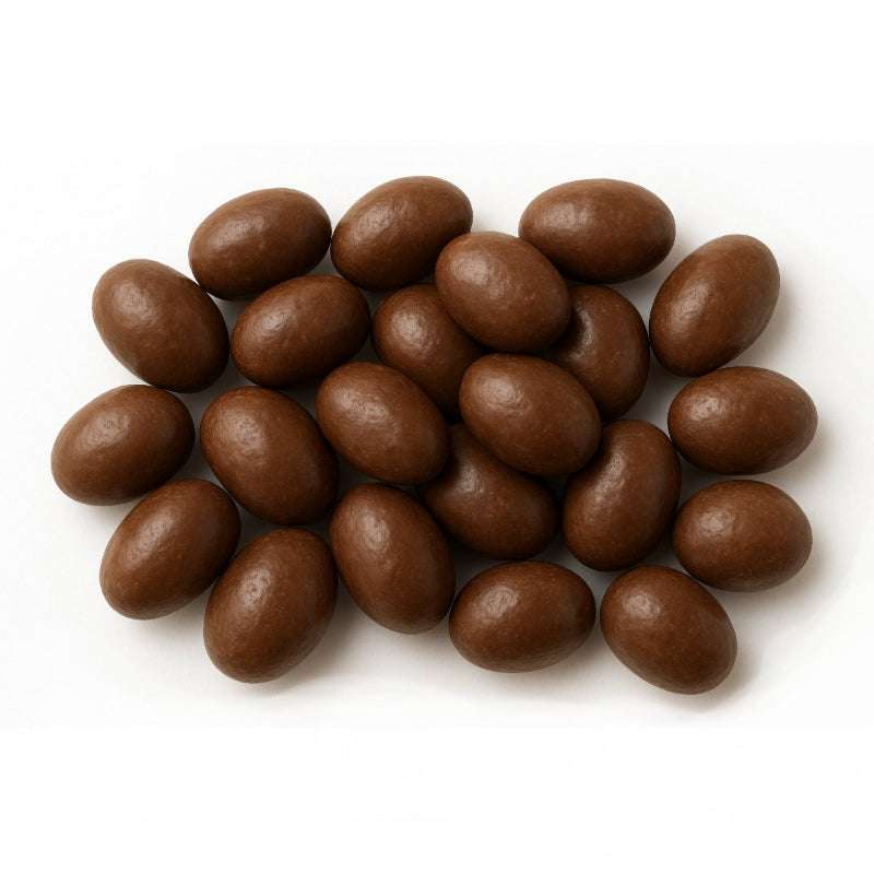 A close-up of Mylk Chocolate raisins ORGANIC (per 100g) showing smooth, shiny chocolate-coated raisins on white background