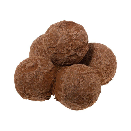 Brown truffles on a white background