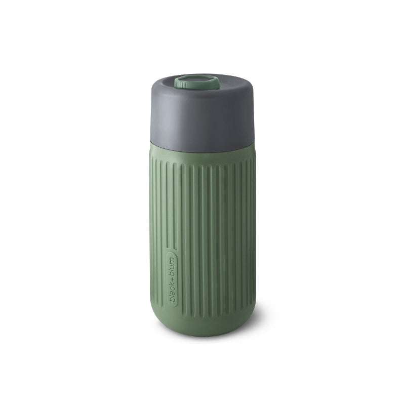 Green and gray textured tumbler on a white background