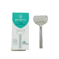 Georganics tube squeezer tool with packaging on a white background