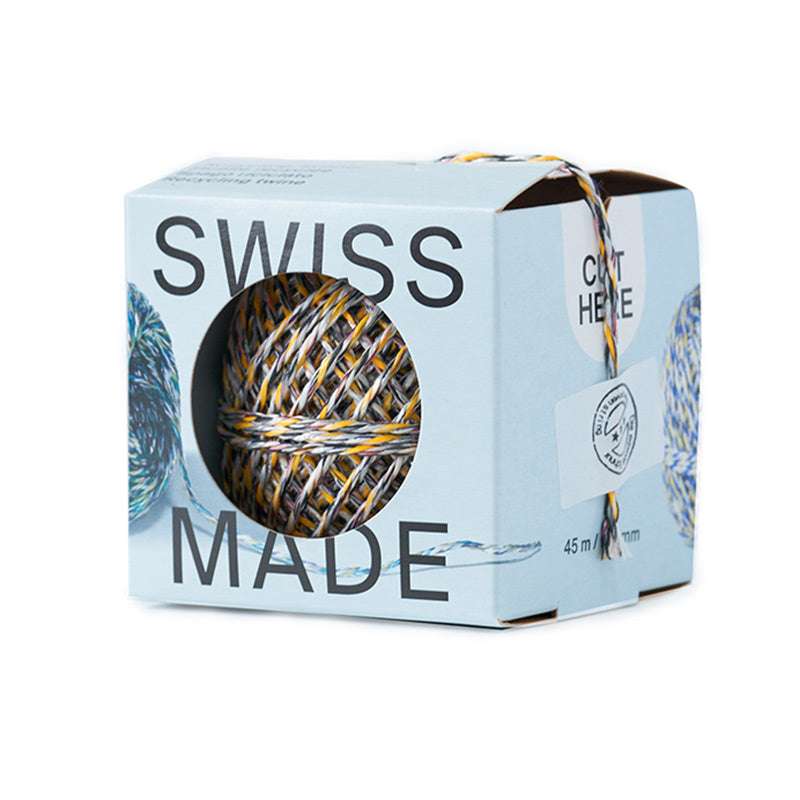 Recycled Twine In Dispenser showing multicolored twine ball in eco-friendly packaging with cut here label.