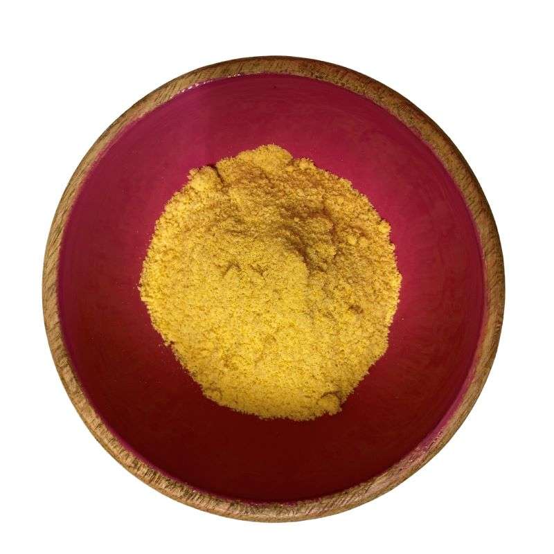 Asafoetida (per 50g) natural yellow spice powder in a wooden bowl from a sustainable refill shop