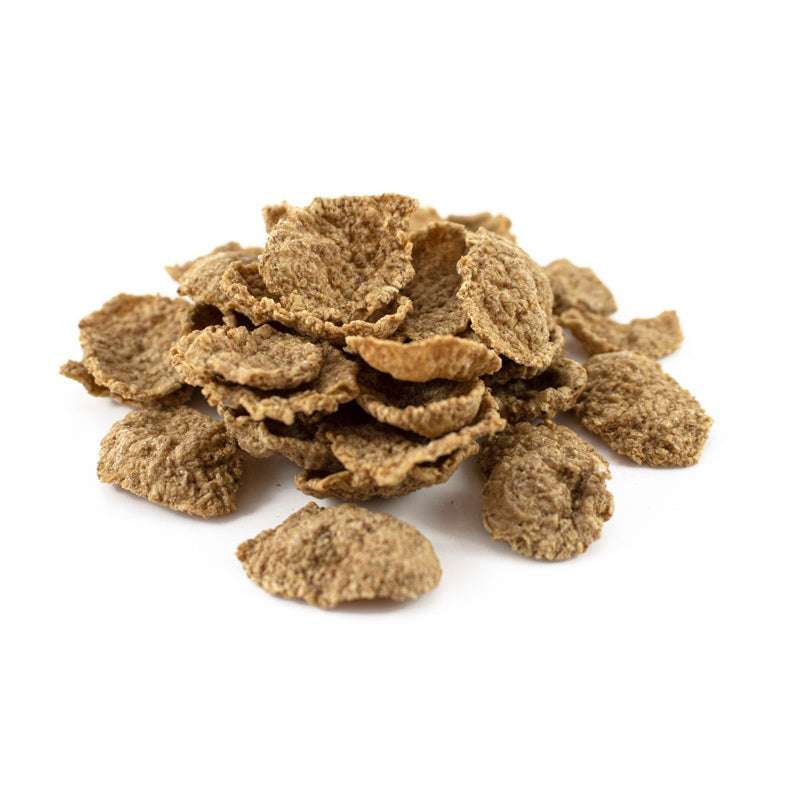 Close-up of bran flakes cereal pile representing Bran Flakes Malted ORGANIC (per 500g) with natural organic texture