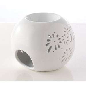 White Ceramic Oil Burner/Wax Melter with floral cutout design for organic and plastic free home fragrance use.