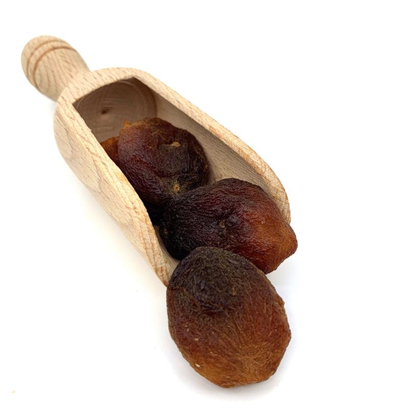 Three dried apricots in a wooden scoop representing Dried Apricots - unsulphured ORGANIC (per 300g) natural food product