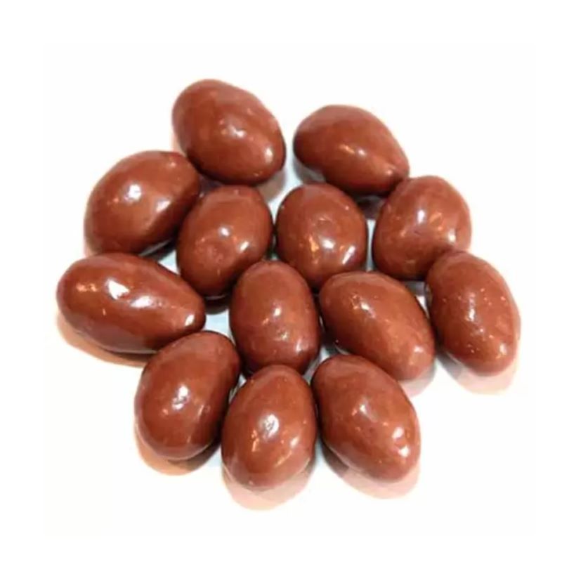 Close-up of smooth milk chocolate covered nuts arranged together, Milk Chocolate BRAZILS (per 100g) for ethical treat choices