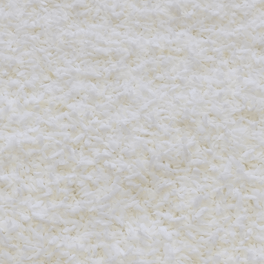 Close-up of Coconut Desiccated ORGANIC showing natural, organic shredded coconut flakes in white.