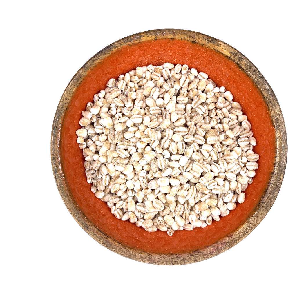 Top view of a wooden bowl filled with Barley Pearl ORGANIC (per 500g) grains on a white background