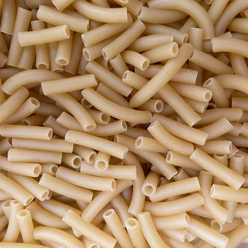 Close-up of uncooked penne pasta