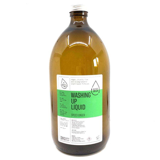 Bottle of washing up liquid with a green label on a white background