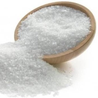 Epsom Salts (per 500g) in a wooden bowl spilling onto a white surface, natural and sustainable product