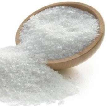 Epsom Salts (per 500g) in a wooden bowl spilling onto a white surface, natural and sustainable product