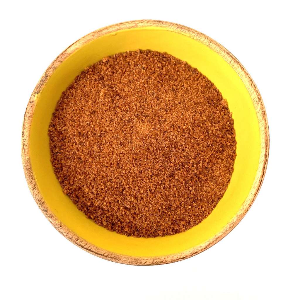 Close-up of Coconut Sugar ORGANIC (per 500g) in a yellow bowl, showcasing natural organic food in a refill shop setting.