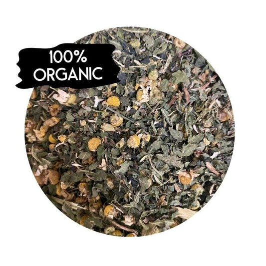 Close-up of dried herbs and flowers in Allergy Relief Tea Blend Organic (per 100g) with 100% organic label visible