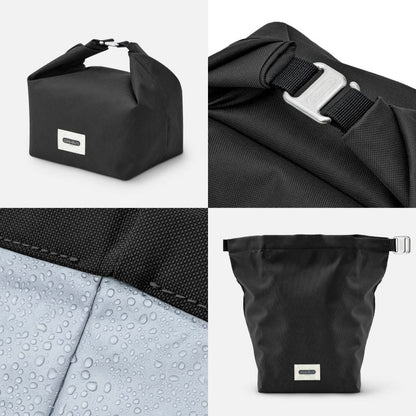 Black bag with a buckle on a white background