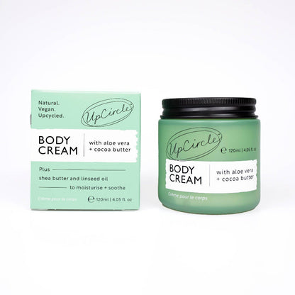 UpCircle body cream jar and packaging on a white background
