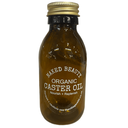Amber glass bottle of Caster Oil ORGANIC with gold cap, promoting natural skincare and ethical, sustainable sourcing.