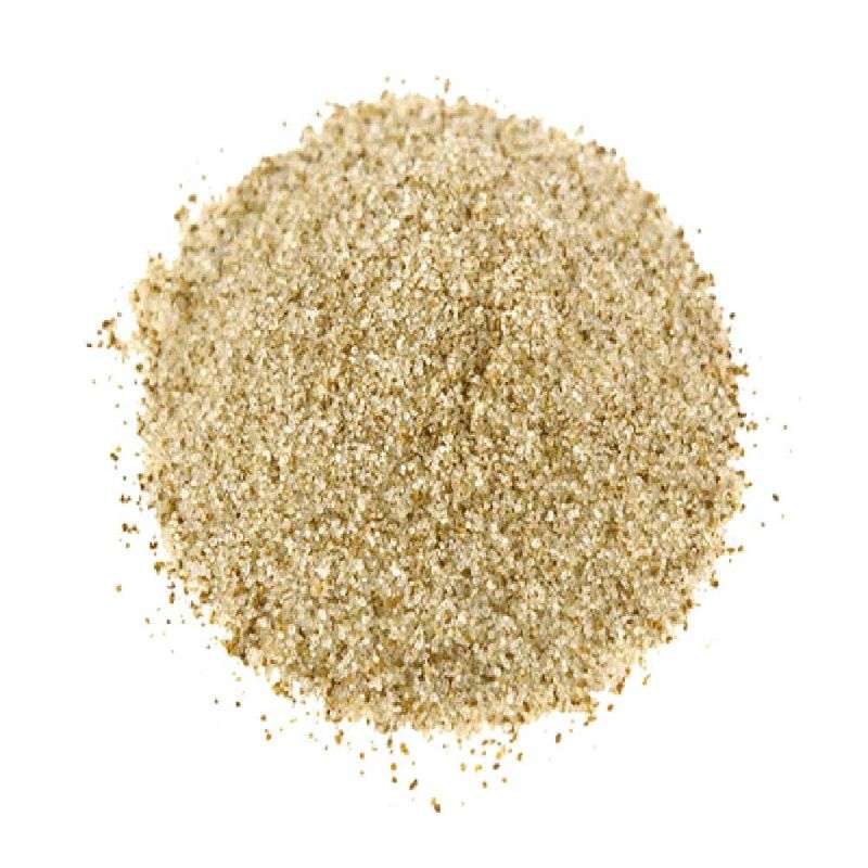 Close-up of natural celery salt granules in a pile representing Celery Salt from a sustainable refill shop.