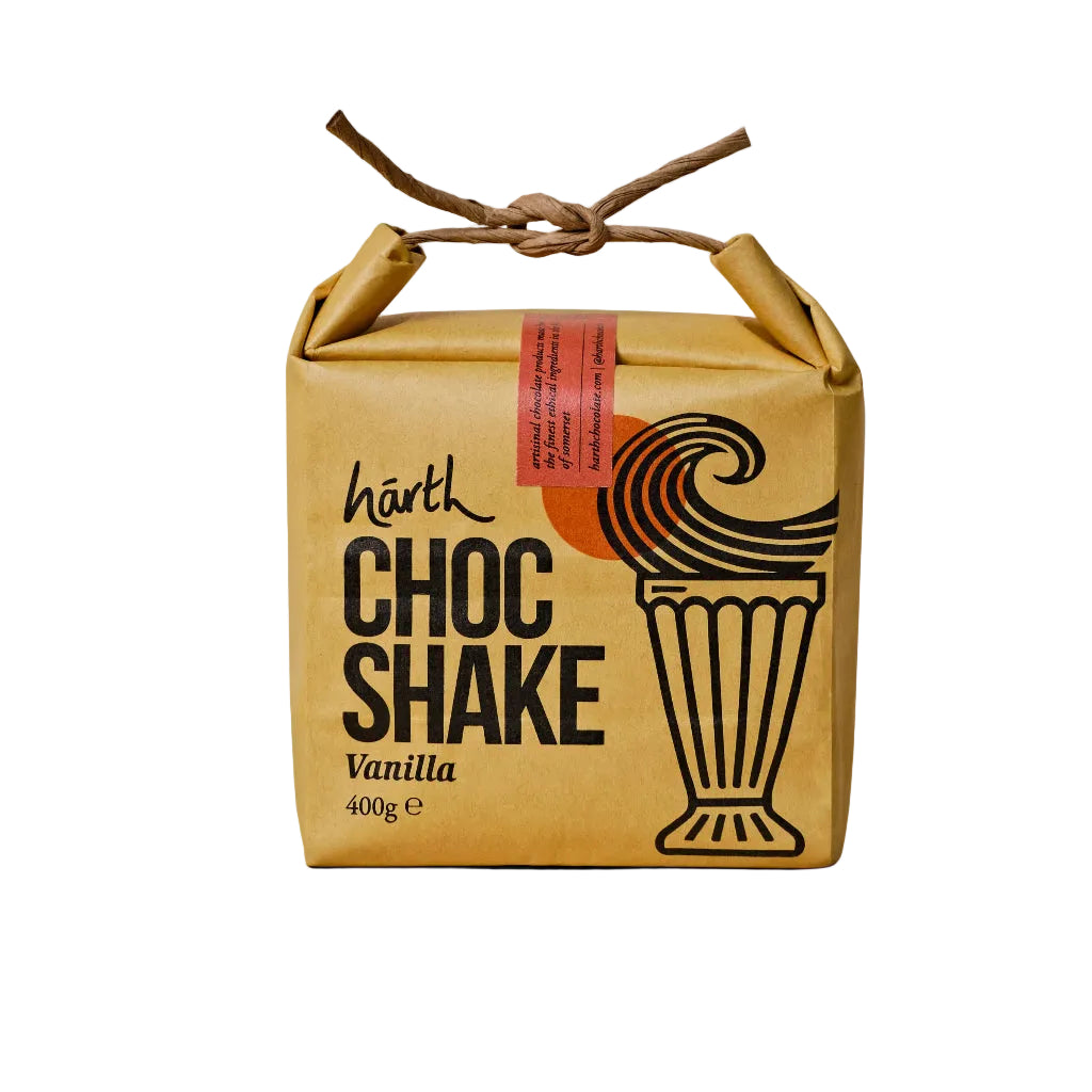 Box of härth Choc Shake Vanilla on a beige background