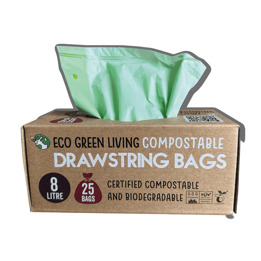 Box of eco-friendly compostable drawstring bags with a green bag peeking out.