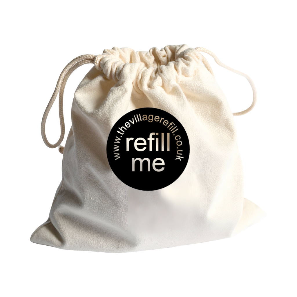 White drawstring bag with 'The Village Refill' logo on a white background