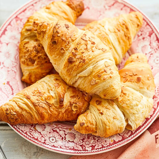 Light and flaky pastry with a soft, sweet almond centre, topped with a sprinkling of flaked almonds.