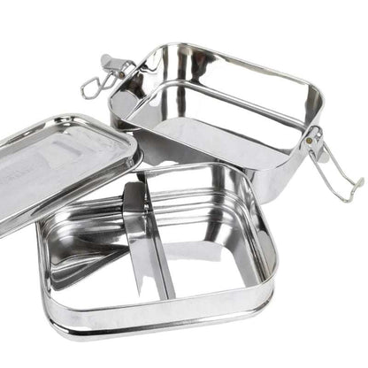 Stainless steel food containers with lids on a white background