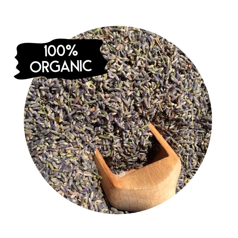 Close-up of dried lavender buds with a wooden scoop labeled 100% organic for Lavender tea ORGANIC (per 50g)