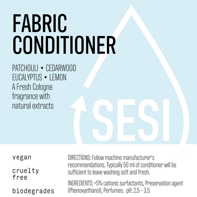 Label of Fabric Conditioner with natural extracts including patchouli, cedarwood, eucalyptus, and lemon. The product is vegan, cruelty-free, and biodegradable.