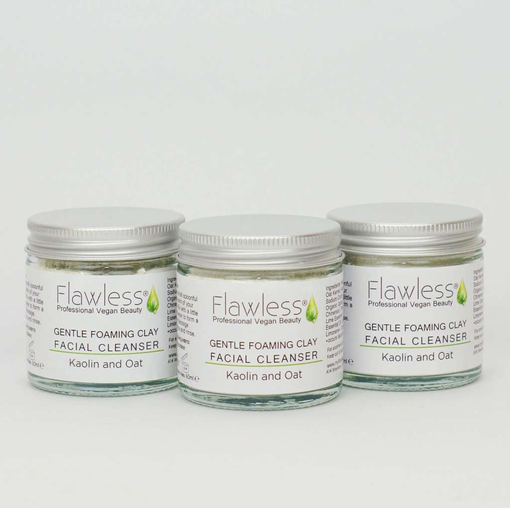 Three jars of Flawless Gentle Foaming Clay Facial Cleanser on a white background