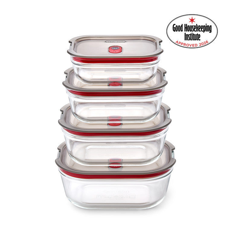 A stack of four nested clear glass storage containers with gray lids and red silicone seals, shown on a white background with a Good Housekeeping Institute Approved 2026 badge in the top right corner.
