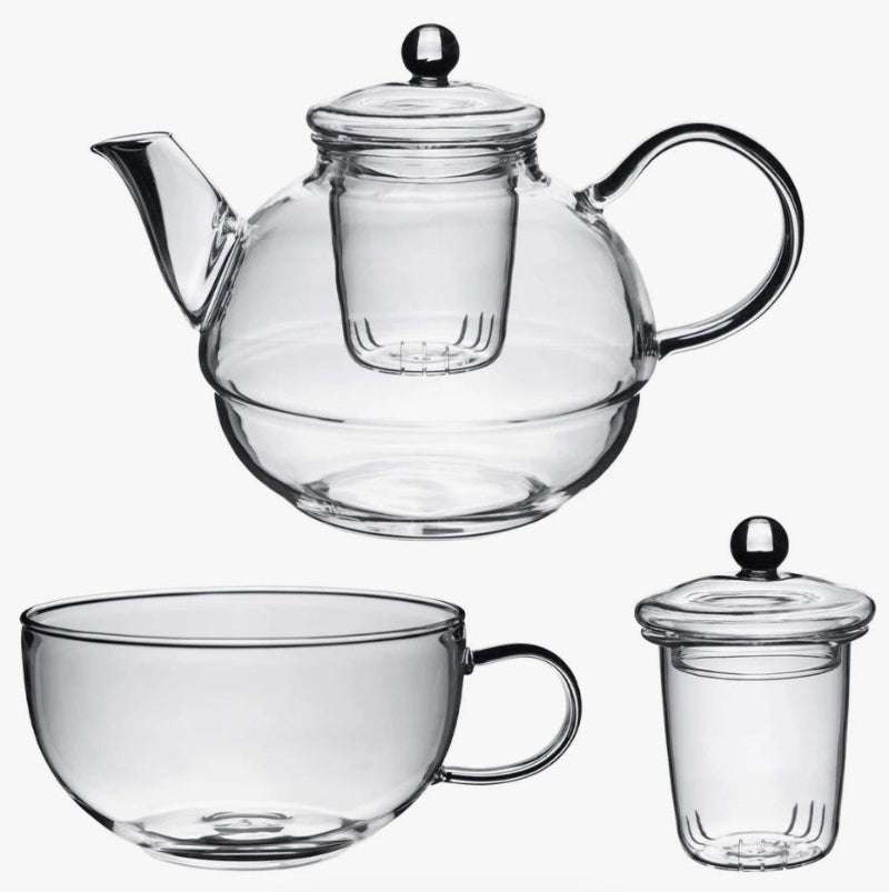 Glass Tea-For-One Tea Pot, Cup and Strainer Set made of clear glass with a modern, minimalist design.
