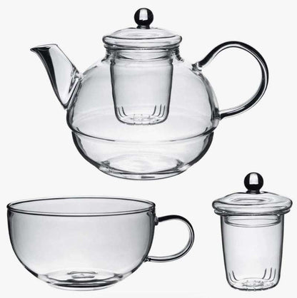 Glass Tea-For-One Tea Pot, Cup and Strainer Set made of clear glass with a modern, minimalist design.