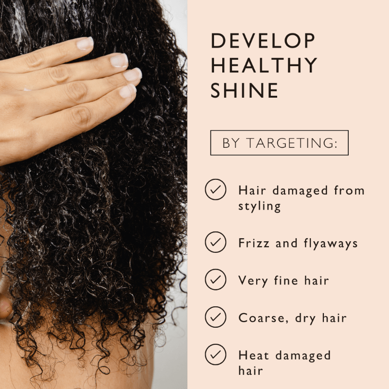 Person with curly hair holding it, alongside text on a beige background about developing healthy shine.