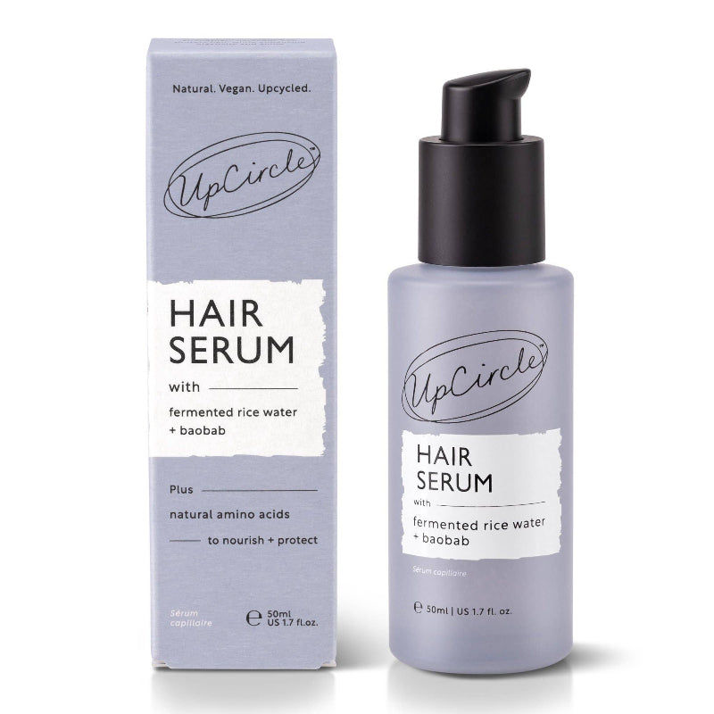 UpCircle hair serum bottle and packaging on a white background