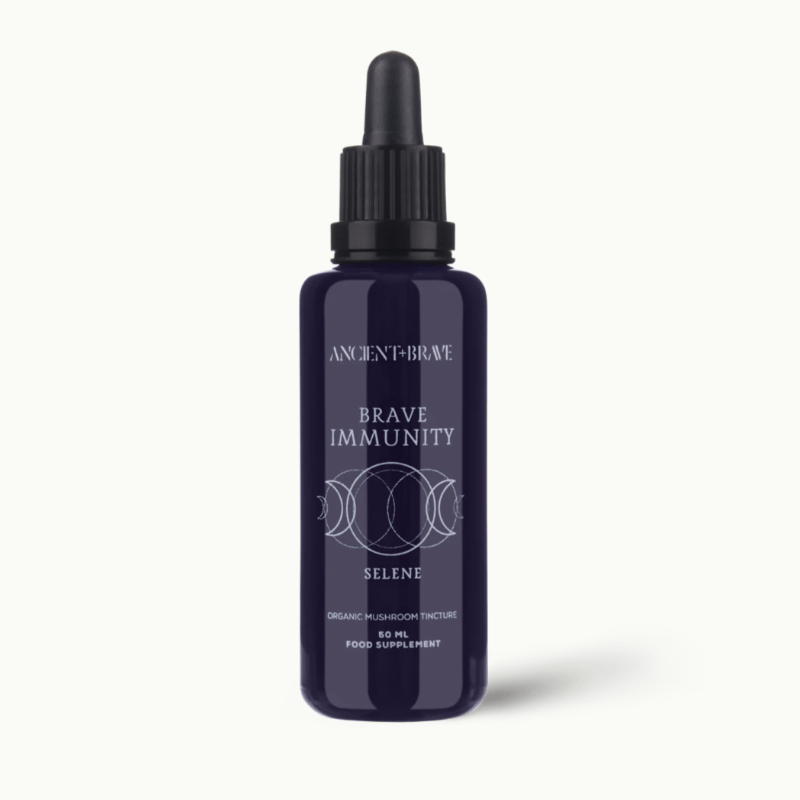 Blue bottle labelled 'Brave Immunity' with dropper on a white background