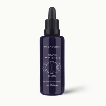 Blue bottle labelled 'Brave Immunity' with dropper on a white background
