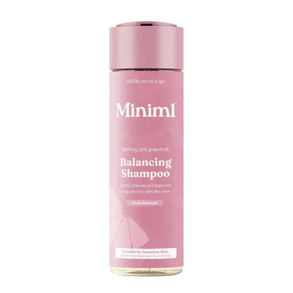 Pink shampoo bottle labeled 'Miniml' on a white background