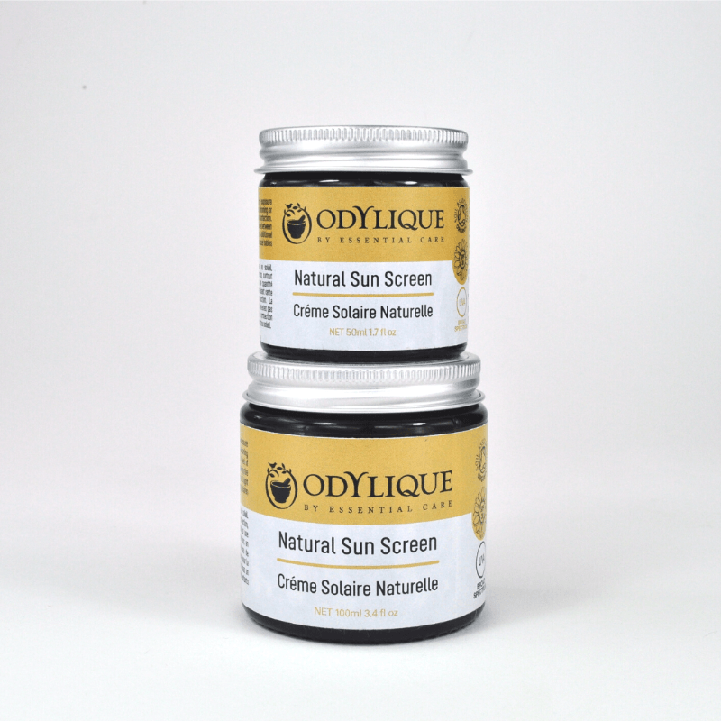 Two jars of Odylique natural sunscreen on a white background
