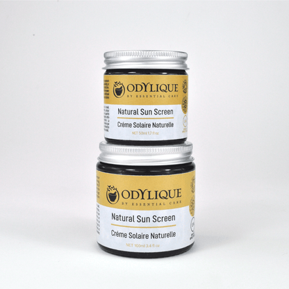 Two jars of Odylique natural sunscreen on a white background