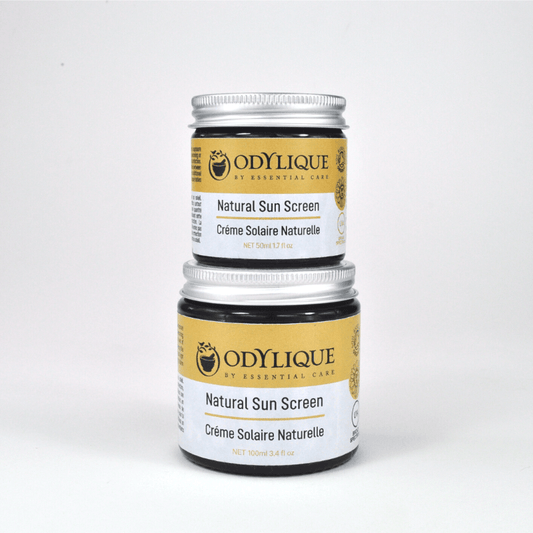 Two jars of Odylique natural sunscreen on a white background